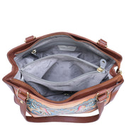 The Anuschka Medium Everyday Tote - 710 is a brown genuine leather tote bag adorned with floral designs. It features two main compartments and a central zippered pocket, all lined with light gray fabric that has a subtle pattern.