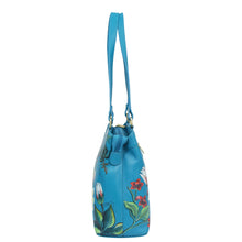 Load image into Gallery viewer, Blue leather Medium Everyday Tote - 710 with floral design on a white background by Anuschka.
