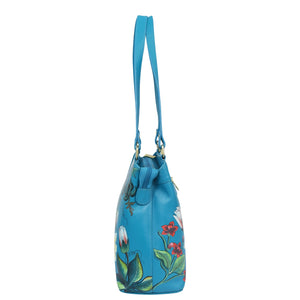 Blue leather Medium Everyday Tote - 710 with floral design on a white background by Anuschka.