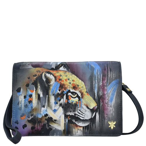 Handbag with a painted tiger design, a star embellishment, and an RFID blocking feature - Anuschka's 4 in 1 Organizer Crossbody - 711.