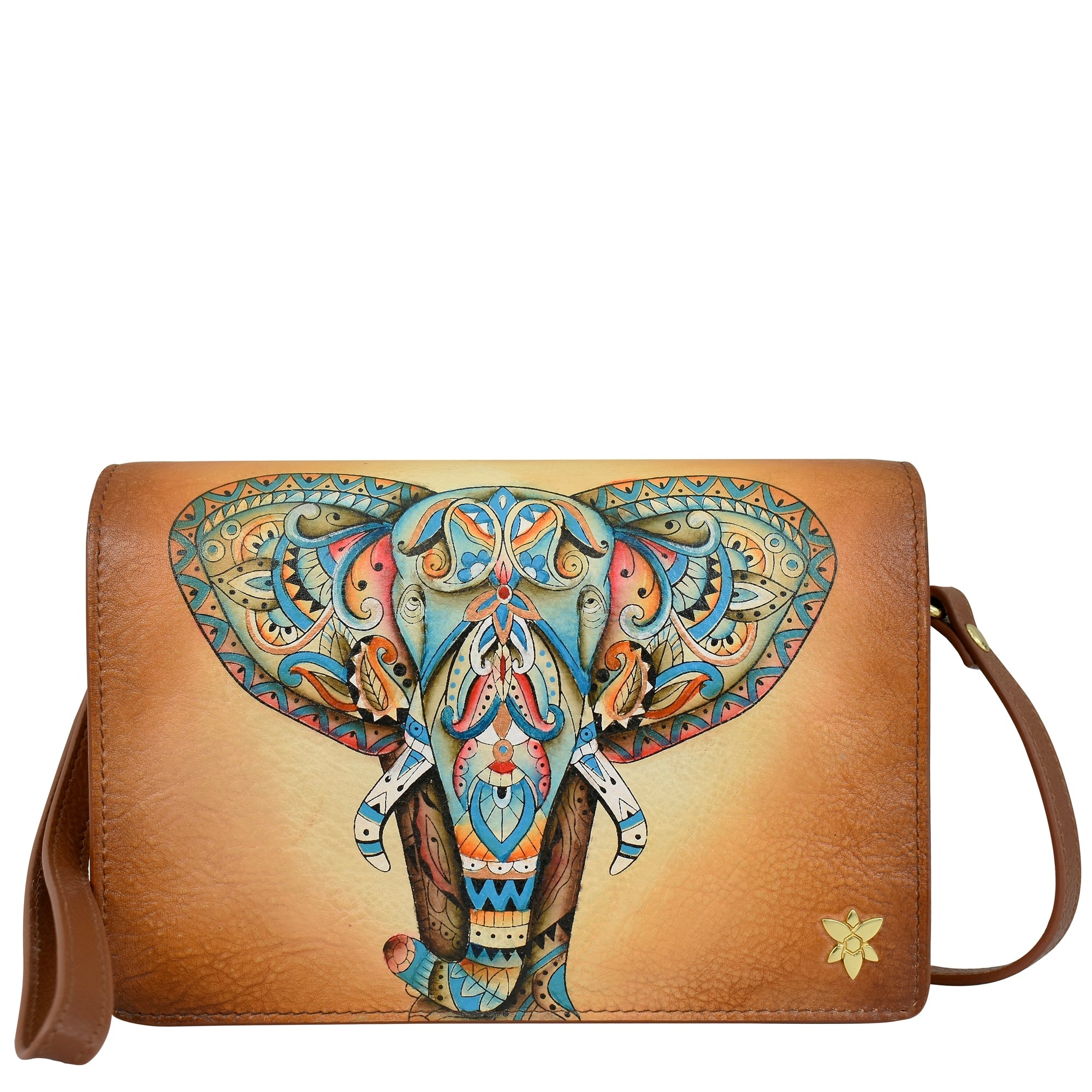 The 4 in 1 Organizer Crossbody - 711 by Anuschka is a brown handbag made of genuine leather, adorned with an intricate, colorful elephant design on the front. A flower emblem decorates the lower right corner. For versatility, it features a removable crossbody strap attached on the right side.