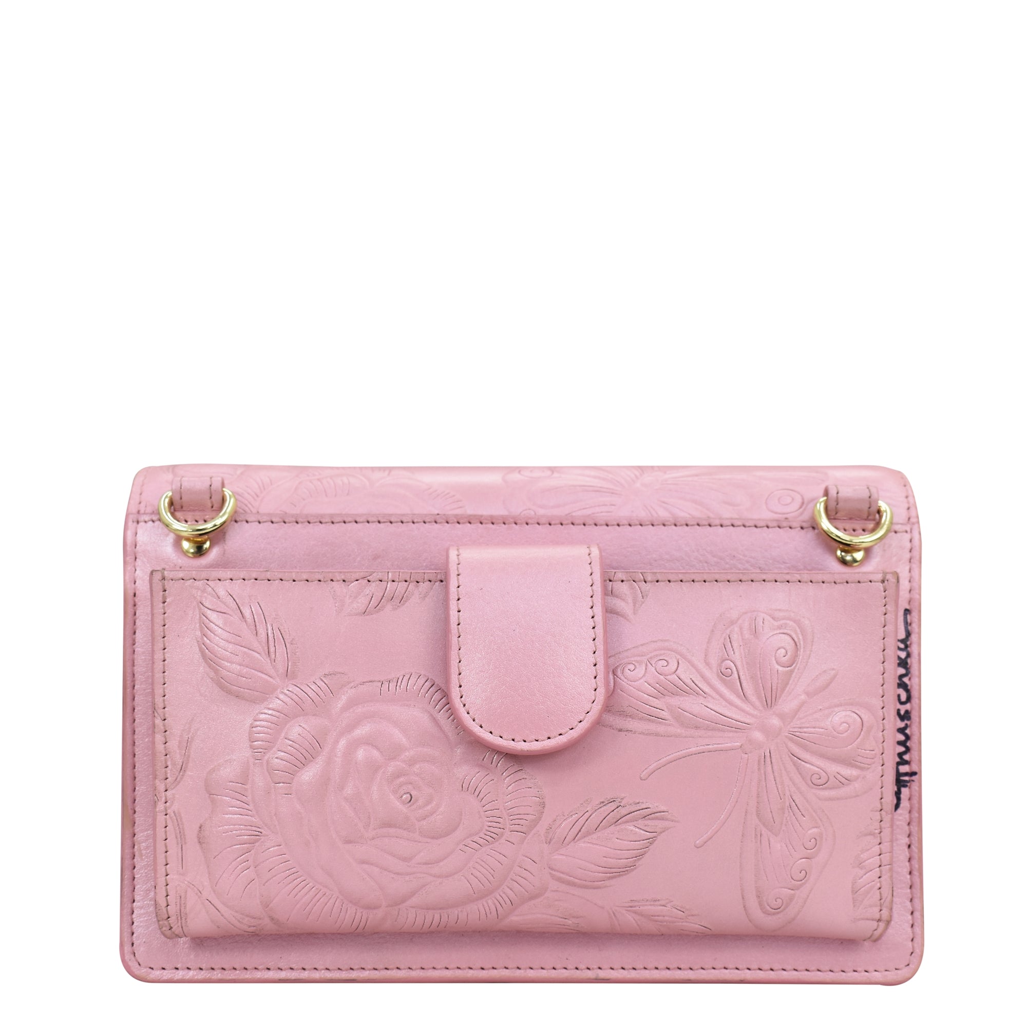 Pink genuine leather 4 in 1 Organizer Crossbody - 711 with floral embossing and a wristlet strap by Anuschka.