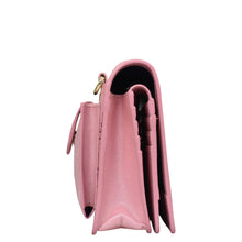 Load image into Gallery viewer, Side view of a pink Anuschka 4 in 1 Organizer Crossbody - 711 with a visible inner compartment and RFID blocking.
