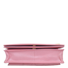 Load image into Gallery viewer, Pink Anuschka 4 in 1 Organizer Crossbody - 711 on a white background.
