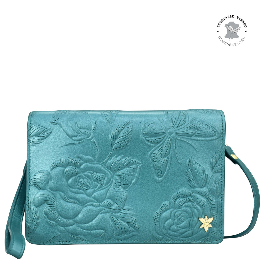 Anuschka 4 in 1 Organizer Crossbody - 711 genuine leather wallet with embossed floral design and brand logo.