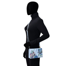 Load image into Gallery viewer, Mannequin displaying an Anuschka 4 in 1 Organizer Crossbody - 711.
