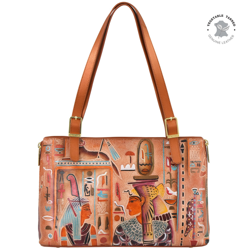 The Anuschka Expandable Shopper Tote - 712 is a genuine leather rectangular handbag featuring artistic Egyptian-themed designs, brown straps, and a 