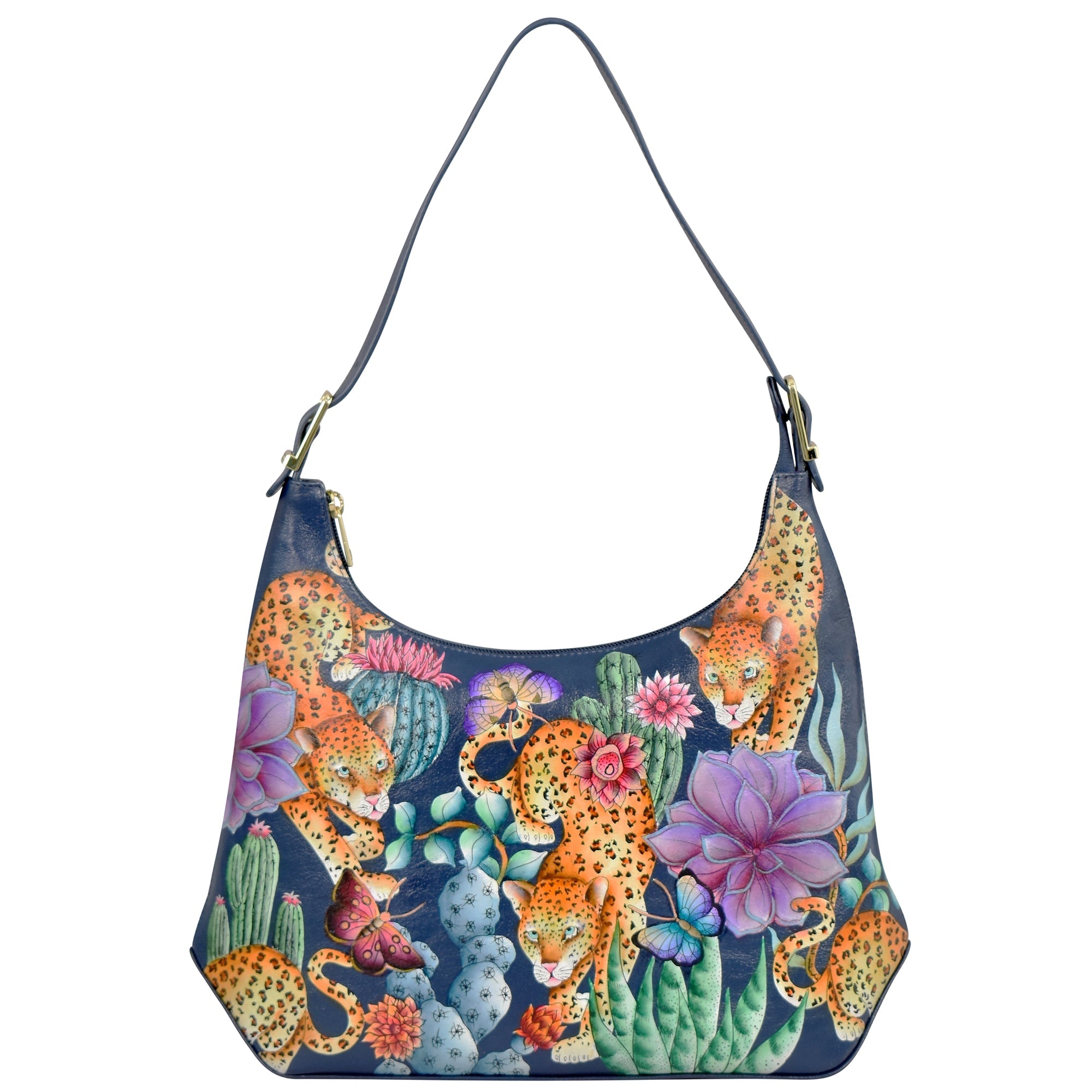 Presenting the Anuschka Slim Shoulder Hobo - 714, a genuine leather handbag with a vibrant design featuring leopards, butterflies, and colorful flowers in a garden setting. This modern Hobo style bag boasts solid blue straps and edges, making it perfect for everyday use.