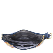 Image of an open Slim Shoulder Hobo - 714 by Anuschka with a navy blue exterior and floral design, showcasing its organized interior with multiple compartments and pockets. Crafted from genuine leather, this modern handbag features a light grey lining with a subtle pattern, making it the perfect everyday bag.