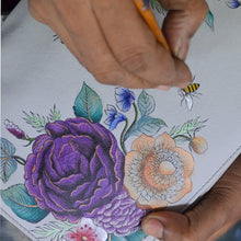 Load image into Gallery viewer, Hand drawing colorful flowers and a bee on an Anuschka Two-Fold Small Organizer Wallet - 1166 with RFID protection.
