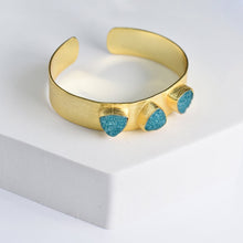 Load image into Gallery viewer, Triangle Druzy Bracelet with turquoise accents on a white display by Vanya Lara.
