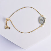 Mojave Glory Bracelet by Vanya Lara with a turquoise pendant on a white background.