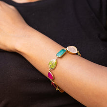 Load image into Gallery viewer, A person wearing an Enchanting Melody bracelet from Vanya Lara on their wrist.
