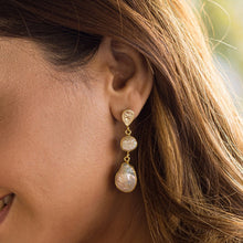 Load image into Gallery viewer, A woman showcasing a pair of Pearl of Joy Earrings by Vanya Lara, gold-plated teardrop earrings with fresh water pearls.
