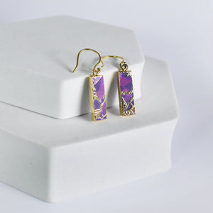Mojave Brick Earrings with Vanya Lara inlay displayed on a white jewelry box.