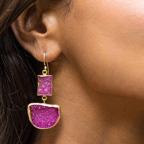 A woman wearing purple Vanya Lara Two-Tiered Geometric Earrings VER0010 with free shipping.
