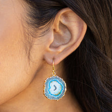 Load image into Gallery viewer, A woman wearing a Vanya Lara sliced quartz earring with a gold-plated edge.
