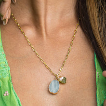 Load image into Gallery viewer, Close-up of a woman wearing a Vanya Lara gold-plated necklace with an Abstract Gemstone Pendant (VNK0005), symbolizing self-love.
