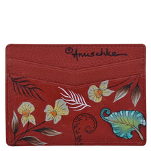 Load image into Gallery viewer, Red floral-patterned leather credit card case with Anuschka designer signature.
