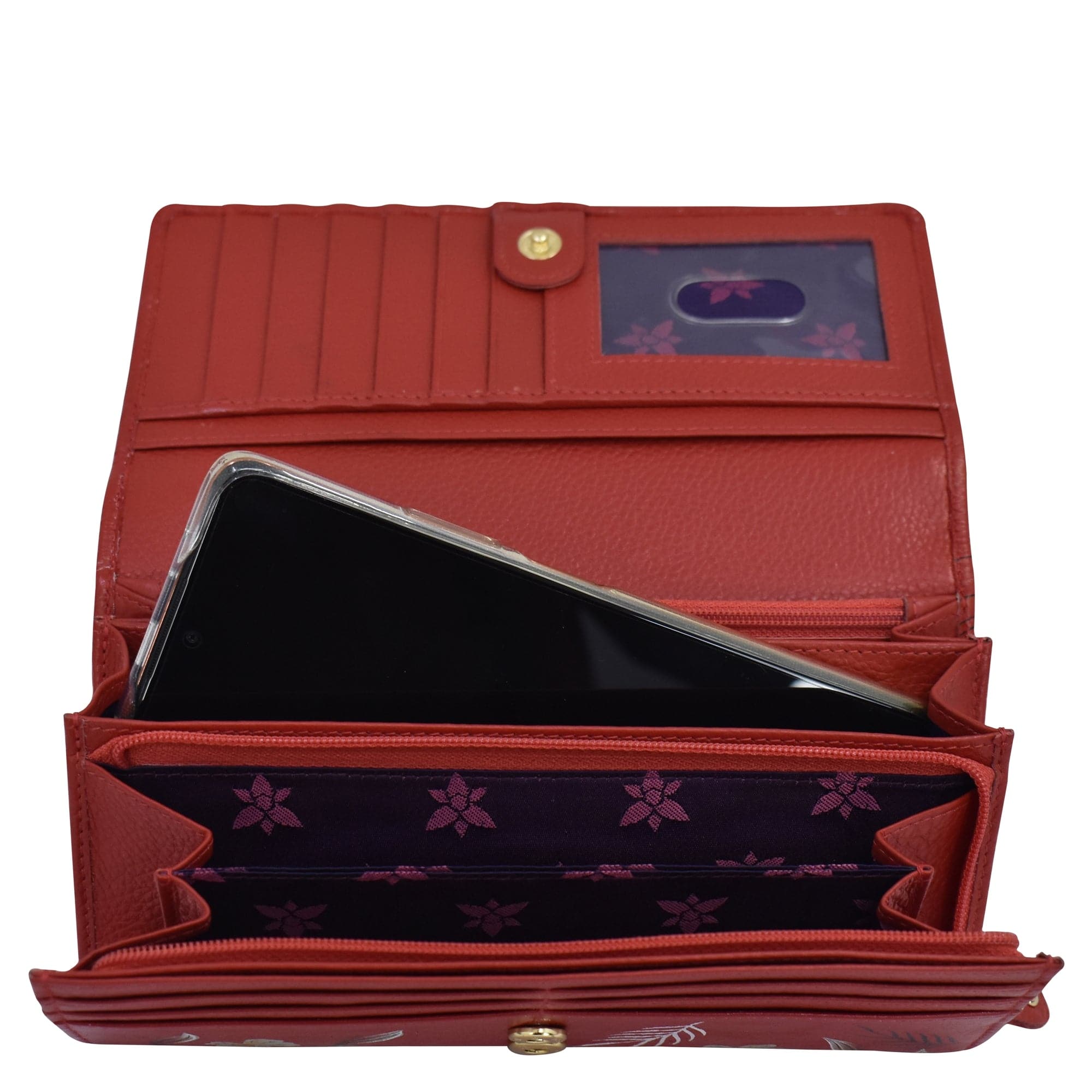Anuschka's Accordion Flap Wallet - 1112 opened to reveal compartments with a smartphone inside, featuring RFID protection.