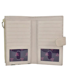 Load image into Gallery viewer, Open Anuschka Cell Phone Case &amp; Wallet - 1113 with card slots and transparent id windows displaying purple floral cards.
