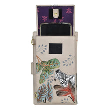 Load image into Gallery viewer, Cell Phone Case &amp; Wallet - 1113 in a beige genuine leather wallet case with a zebra and floral design by Anuschka.
