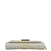 Anuschka Organizer Wallet Crossbody - 1149 with crocodile pattern and metallic clasp.