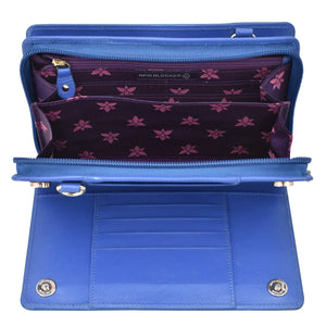 Open blue Anuschka Organizer Wallet Crossbody - 1149 displaying card slots and patterned interior.