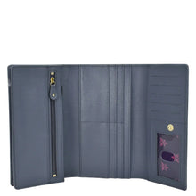 Load image into Gallery viewer, Open Anuschka Three Fold Wallet - 1150 with multiple card slots and a zippered compartment.
