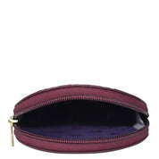 Burgundy-colored, genuine leather Anuschka Round Coin Purse - 1175 on a white background.