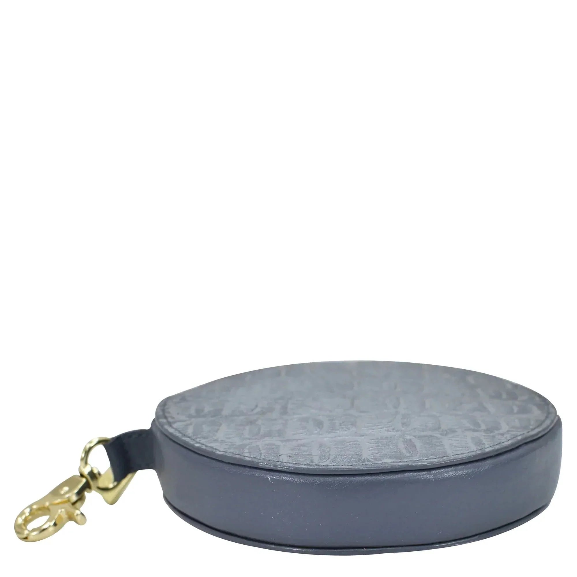 Round Coin Purse - 1175 from Anuschka with a gold clasp.