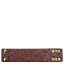 Load image into Gallery viewer, Brown floral embossed Anuschka Leather Adjustable Wrist Band with snap fasteners.
