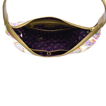 Load image into Gallery viewer, Open Anuschka Fabric with Leather Trim Large Sling Hobo - 12010 showing empty interior with patterned lining and zippered pockets.
