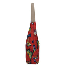 Load image into Gallery viewer, Colorful butterfly print Anuschka tote bag with shoulder strap on a white background.
