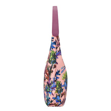 Load image into Gallery viewer, A floral-patterned, pink Anuschka yoga mat bag with a shoulder strap and zippered pockets.
