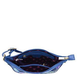 Blue Fabric with Leather Trim East/West Hobo - 12013 handbag with a floral interior design and an adjustable handle on a white background by Anuschka.