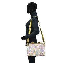 Load image into Gallery viewer, Mannequin displaying an Anuschka Fabric with Leather Trim Multi Compartment Satchel - 12014 with an adjustable shoulder strap against a white background.
