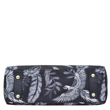 Load image into Gallery viewer, Anuschka navy blue floral-patterned clutch with gold-tone hardware accents and a zippered compartment.
