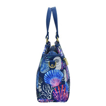 Load image into Gallery viewer, Blue marine-themed shoulder bag with a colorful underwater design featuring an adjustable strap from Anuschka&#39;s Fabric with Leather Trim Multi Compartment Satchel - 12014.

