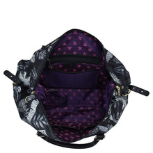 Load image into Gallery viewer, Open empty Anuschka Fabric with Leather Trim Great Escape Duffle - 12016 with a floral pattern, viewed from above, featuring multiple compartments.
