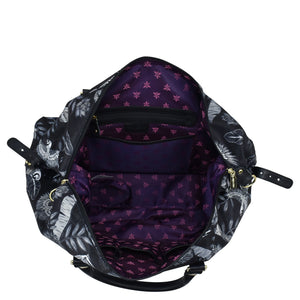 Open empty Anuschka Fabric with Leather Trim Great Escape Duffle - 12016 with a floral pattern, viewed from above, featuring multiple compartments.