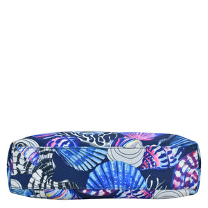 Colorful patterned fabric headband with marine-inspired design and a zippered pocket on a white background Anuschka Fabric with Leather Trim Crossbody with Slip Pocket - 12017.