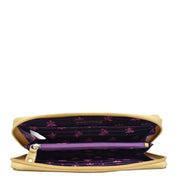 Anuschka Fabric with Leather Trim Wristlet Travel Wallet - 13000, with yellow wristlet and purple floral interior design, partially unzipped on a white background.