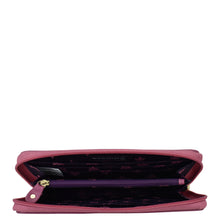 Load image into Gallery viewer, An open, empty pink Anuschka Fabric with Leather Trim Wristlet Travel Wallet - 13000 with a floral pattern inside, isolated on a white background.
