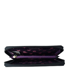 Load image into Gallery viewer, Open Anuschka Fabric with Leather Trim Wristlet Travel Wallet - 13000 with purple interior, RFID protected card slots displayed, and a zippered pocket.
