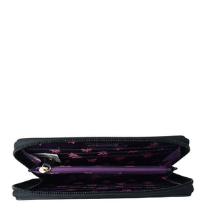 Open Anuschka Fabric with Leather Trim Wristlet Travel Wallet - 13000 with purple interior, RFID protected card slots displayed, and a zippered pocket.