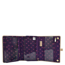 Load image into Gallery viewer, Open Anuschka women&#39;s wallet with multiple compartments, a purple floral pattern, and zippered pockets.
