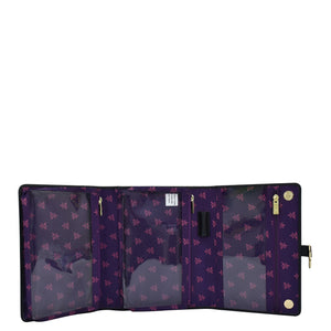 Anuschka Fabric with Leather Trim Toiletry Case - 13001 with multiple compartments and snap button open against a white background.