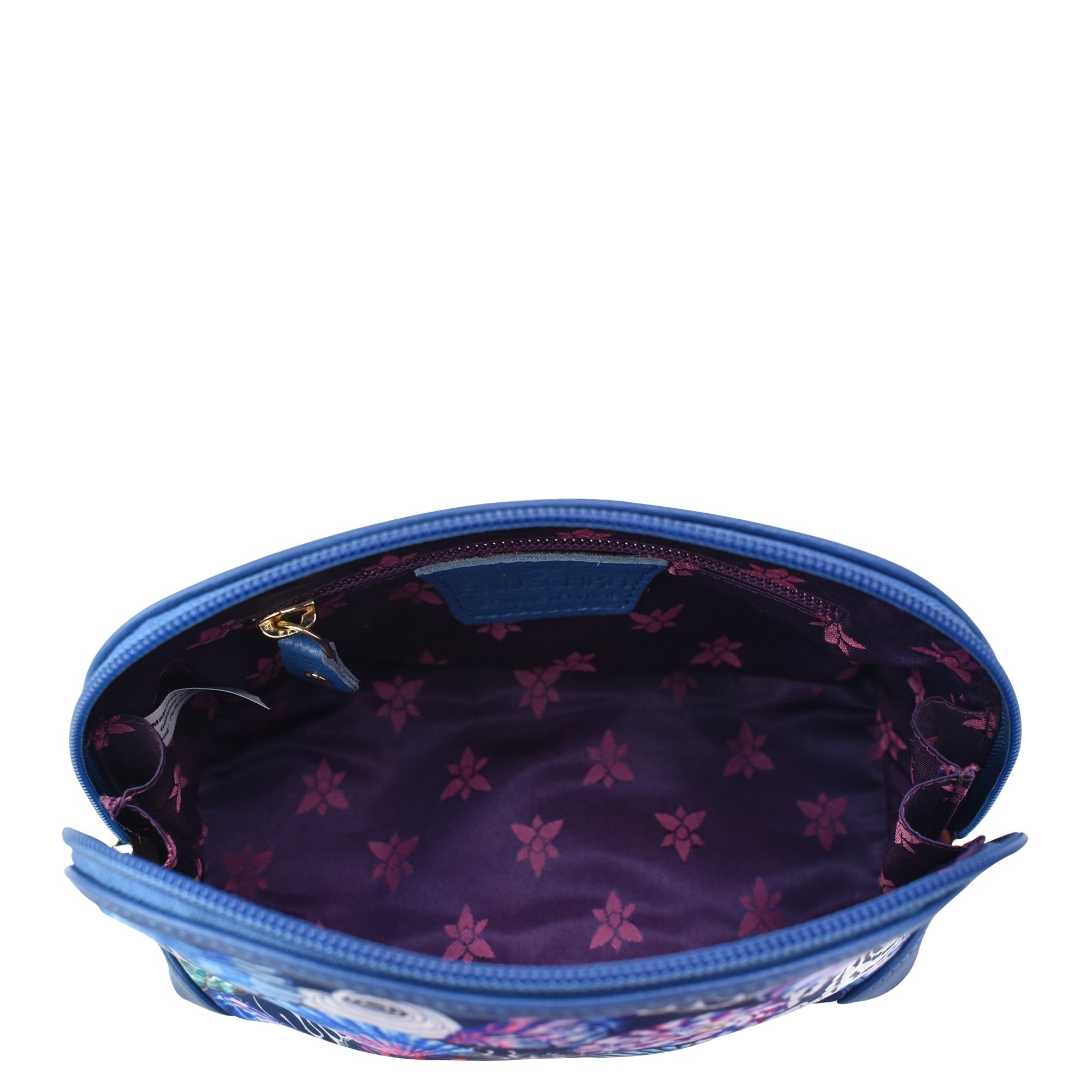 Open empty Anuschka Fabric with Leather Trim Dome Cosmetic Bag - 13002 with a floral pattern interior and full length zippered pocket, isolated on a white background.