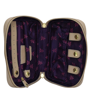 Open Anuschka beige Fabric with Leather Trim Travel Jewelry Organizer - 13003 with purple floral interior and empty compartments.